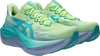 A pair of light green ASICS Superblast 3 (All Gender) shoes from Asics, highlighted with teal and blue accents, showcasing thick soles and laces. Designed for everyday running with responsive FF LEAP cushioning, this pair is viewed from a front angle.