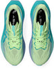 A pair of ASICS Superblast 3 (All Gender) running shoes in light green with teal and blue accents are shown from above. The black insoles feature the Asics logo, while turquoise and blue detailing highlight the sides and sole. Enjoy daily runs with innovative FF LEAP cushioning from Asics for enhanced comfort and performance.